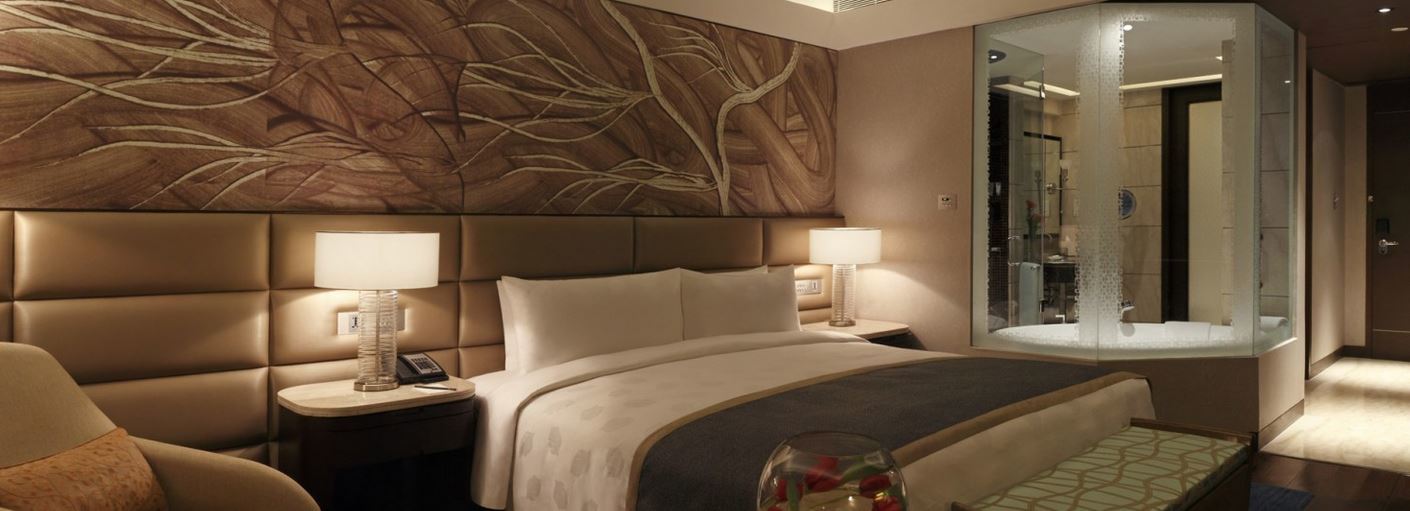 The Leela Ambience Convention Hotel Delhi Nova Deli Exterior foto A bedroom at the hotel